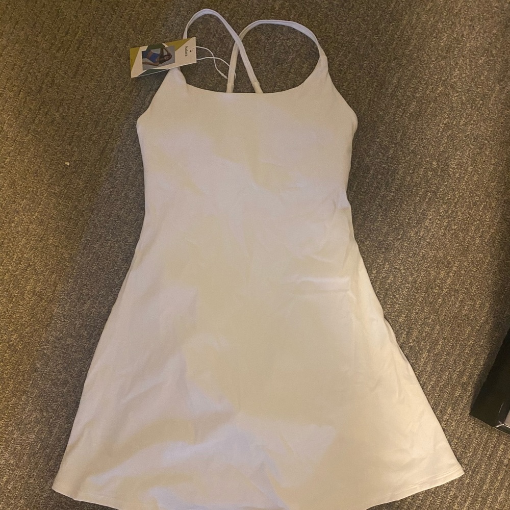 White athletic dress never worn still has tags